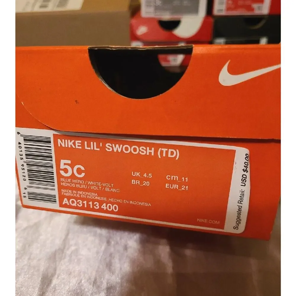 Nike Lil' Swoosh blue and yellow slip on toddler sneaker
